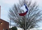 Texas flag at half staff